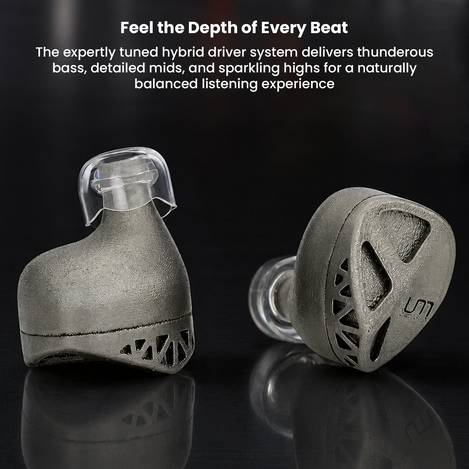 Close-up of titanium in-ear monitors with textured surface and branding