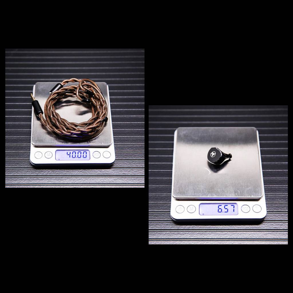 Weight of 7HZ x Crinacle Diablo IEM and cable shown on digital scale, indicating lightweight design for portable use.