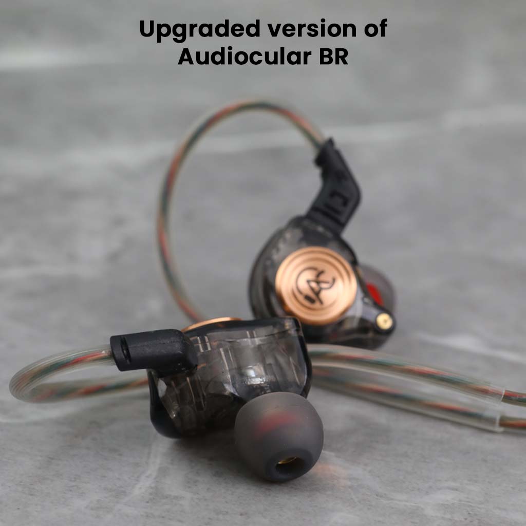 Close-up of upgraded AUDIOCULAR BR Pro IEM in black, showcasing transparent housing and premium build for enhanced audio performance.