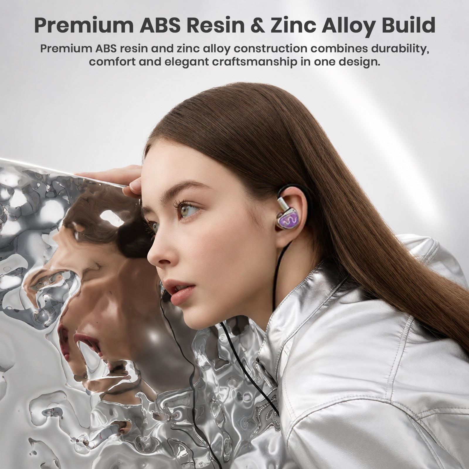 In-ear monitor with purple accents worn by woman