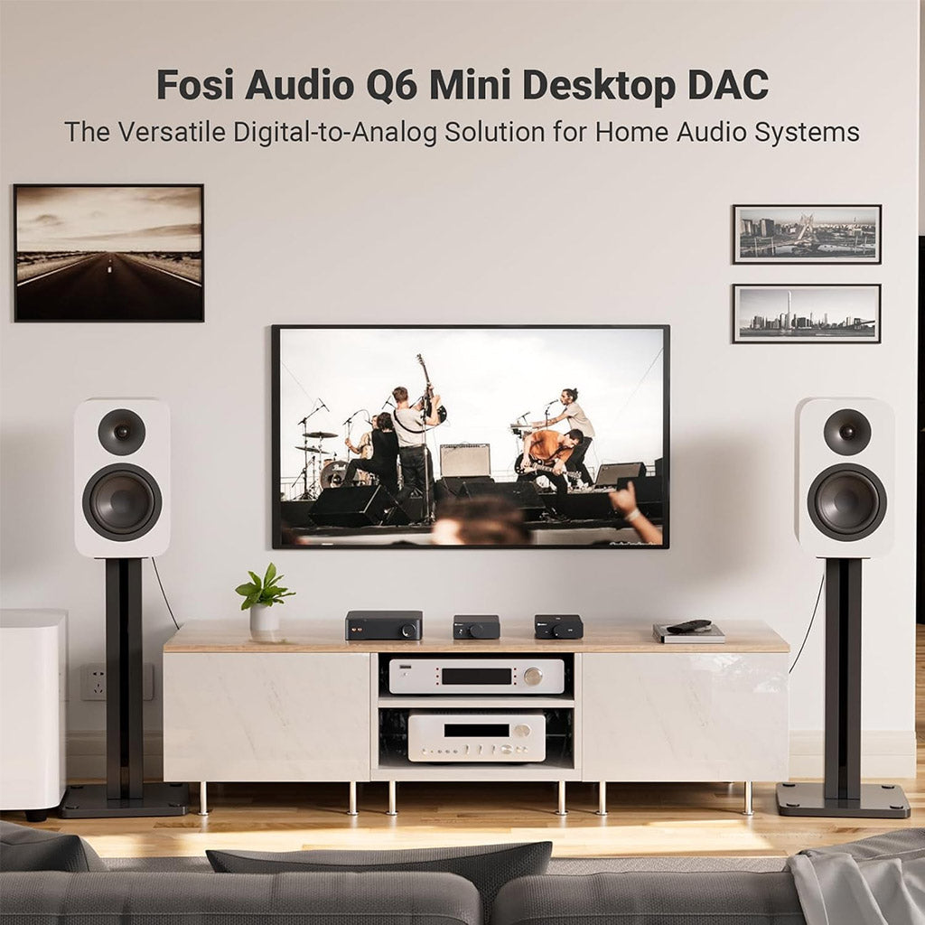 Fosi Audio Q6 DAC in a home audio setup with powered speakers, emphasizing its role as a compact digital-to-analog converter solution.