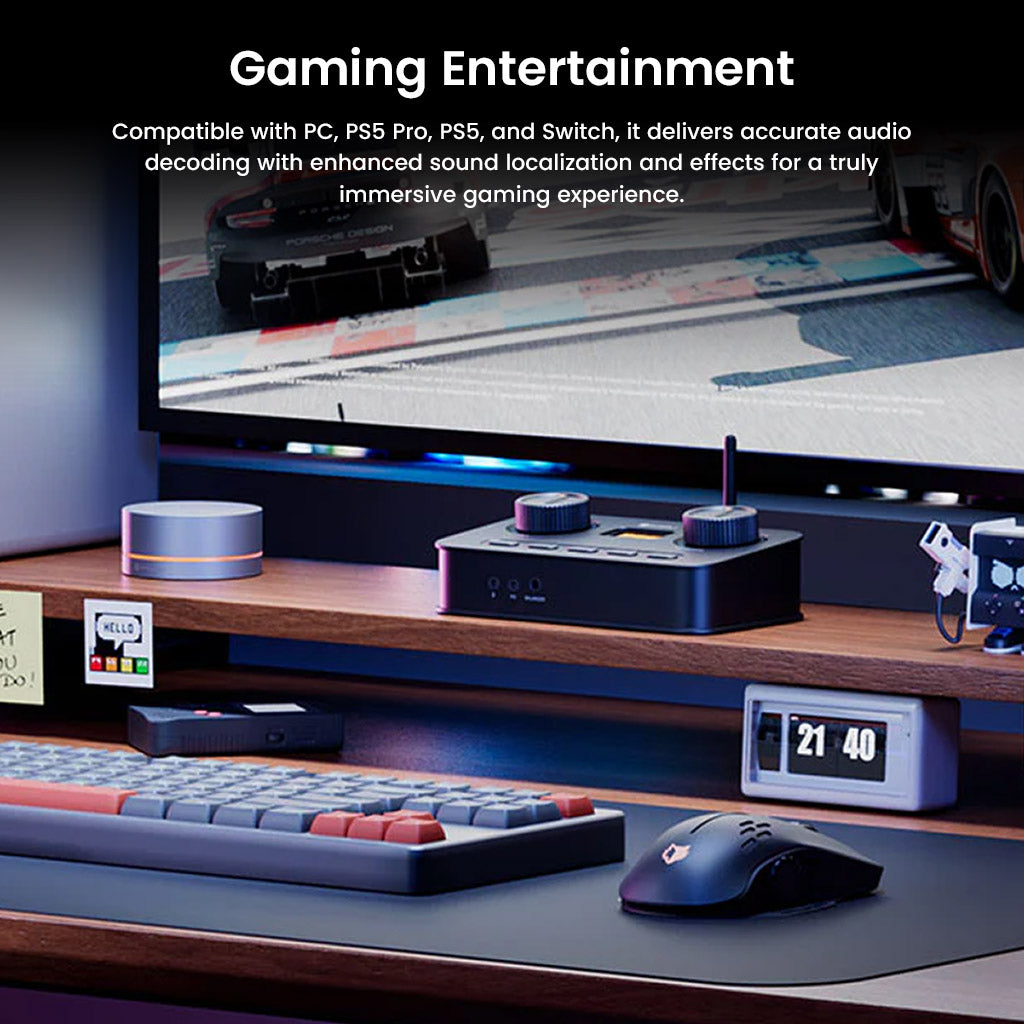Fosi Audio K7 DAC Amp used in a gaming setup with PS5 and monitor, delivering immersive audio for enhanced gaming entertainment experiences.