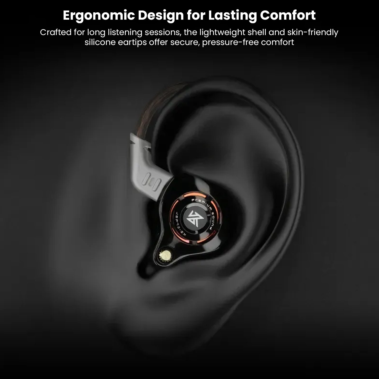 Close-up of black over-ear headphones with control dial