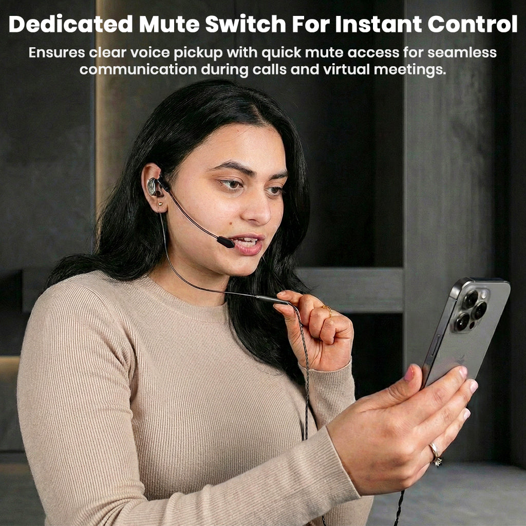 Woman using AUDIOCULAR BOOM-X Gaming IEM Cable with dedicated mute switch for instant voice control during calls and meetings.