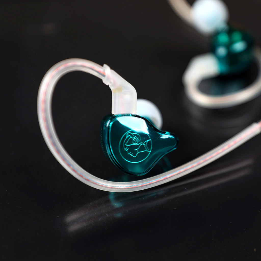 Close-up of AUDIOCULAR BR 10mm Dynamic Driver IEM showcasing teal housing and ergonomic design for comfortable in-ear fit.