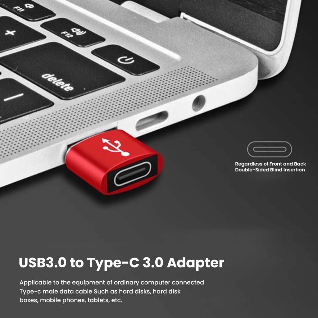 AUDIOCULAR USB 3.0 to Type-C OTG Adapter plugged into a laptop, supporting double-sided blind insertion for convenience.