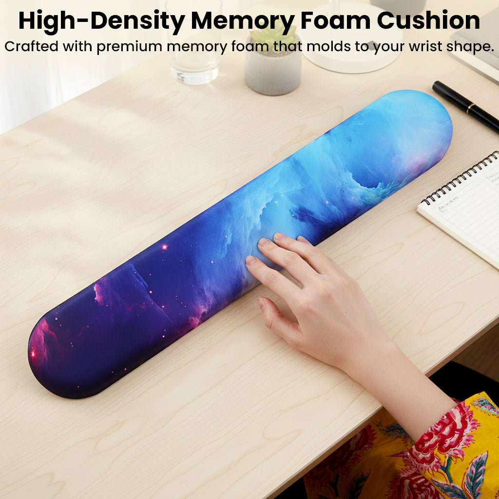 High-density memory foam keyboard wrist rest from TECPHILE in galaxy design, molding to wrist shape for ergonomic comfort.