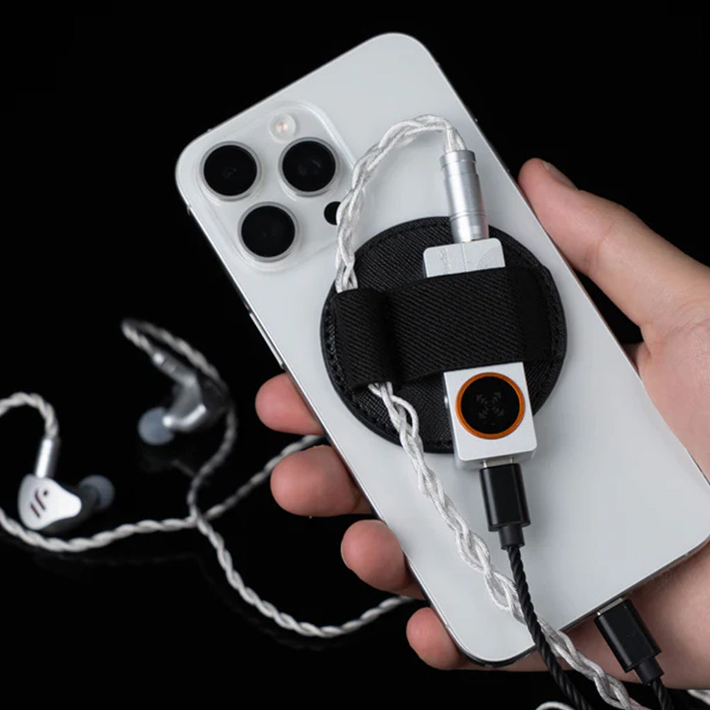 FOSI AUDIO – DS3 Portable DAC/Amp connected to a smartphone with IEMs, demonstrating portable use and compatibility with mobile devices.