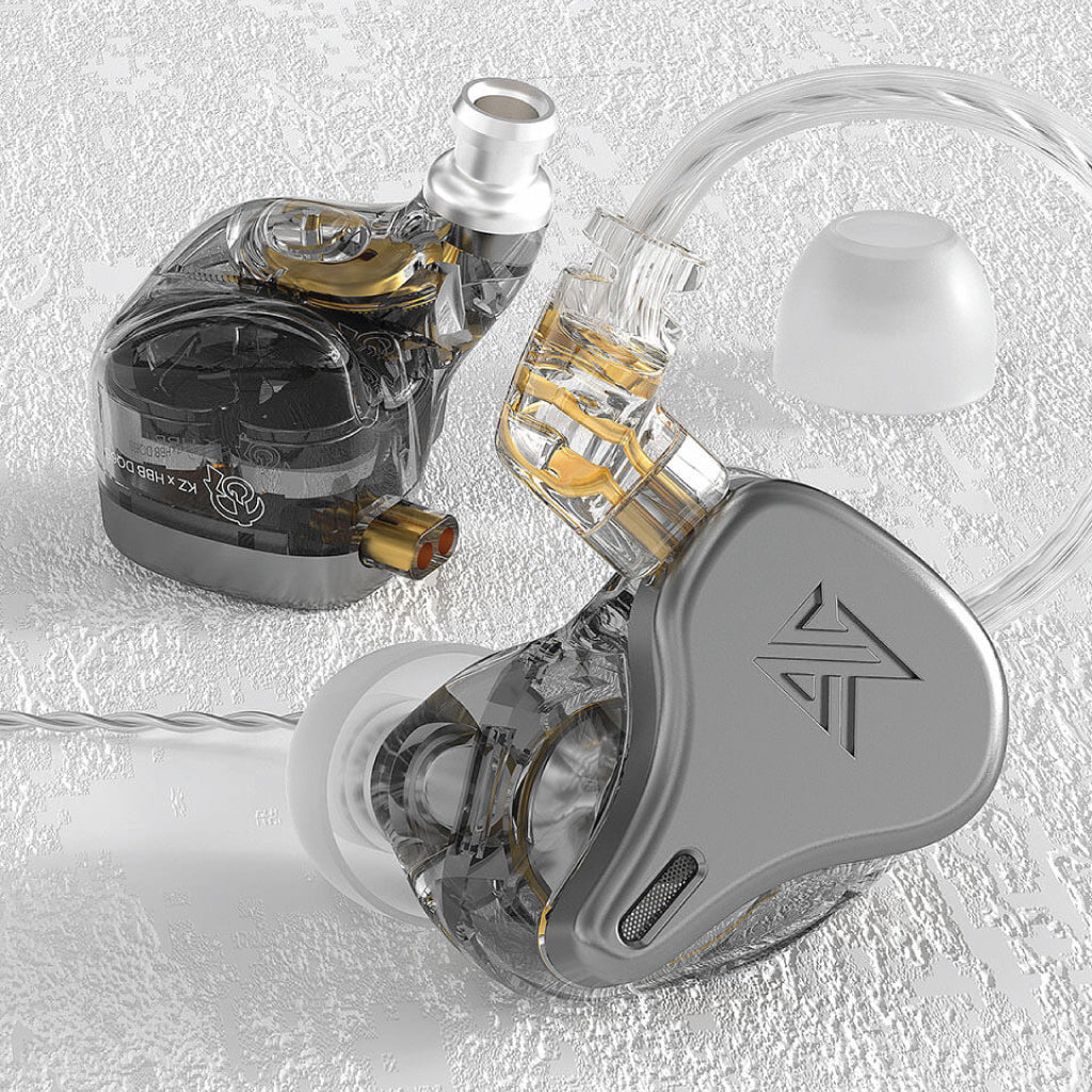 Close-up of KZ x HBB – DQ6S 3 Dynamic Driver In Ear Monitor highlighting transparent housing and triple dynamic driver layout for immersive sound.