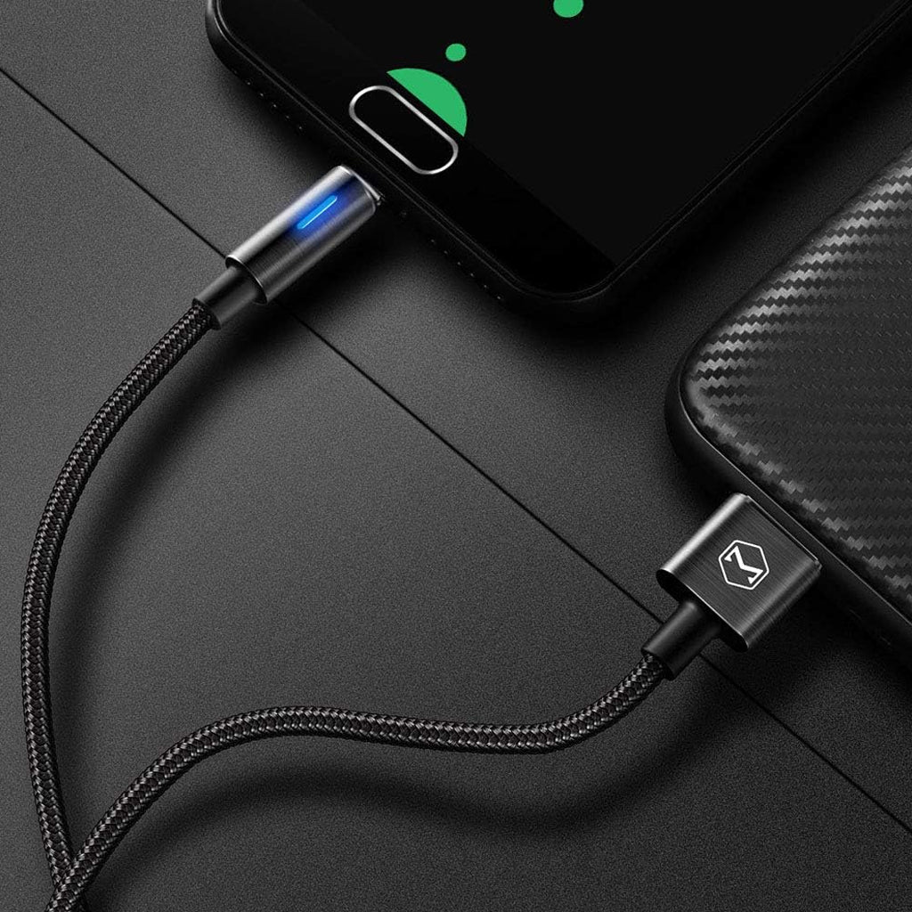Mcdodo - Fast Charging Cable for USB-A Devices connected to smartphone, showing LED charging indicator and sleek braided design.