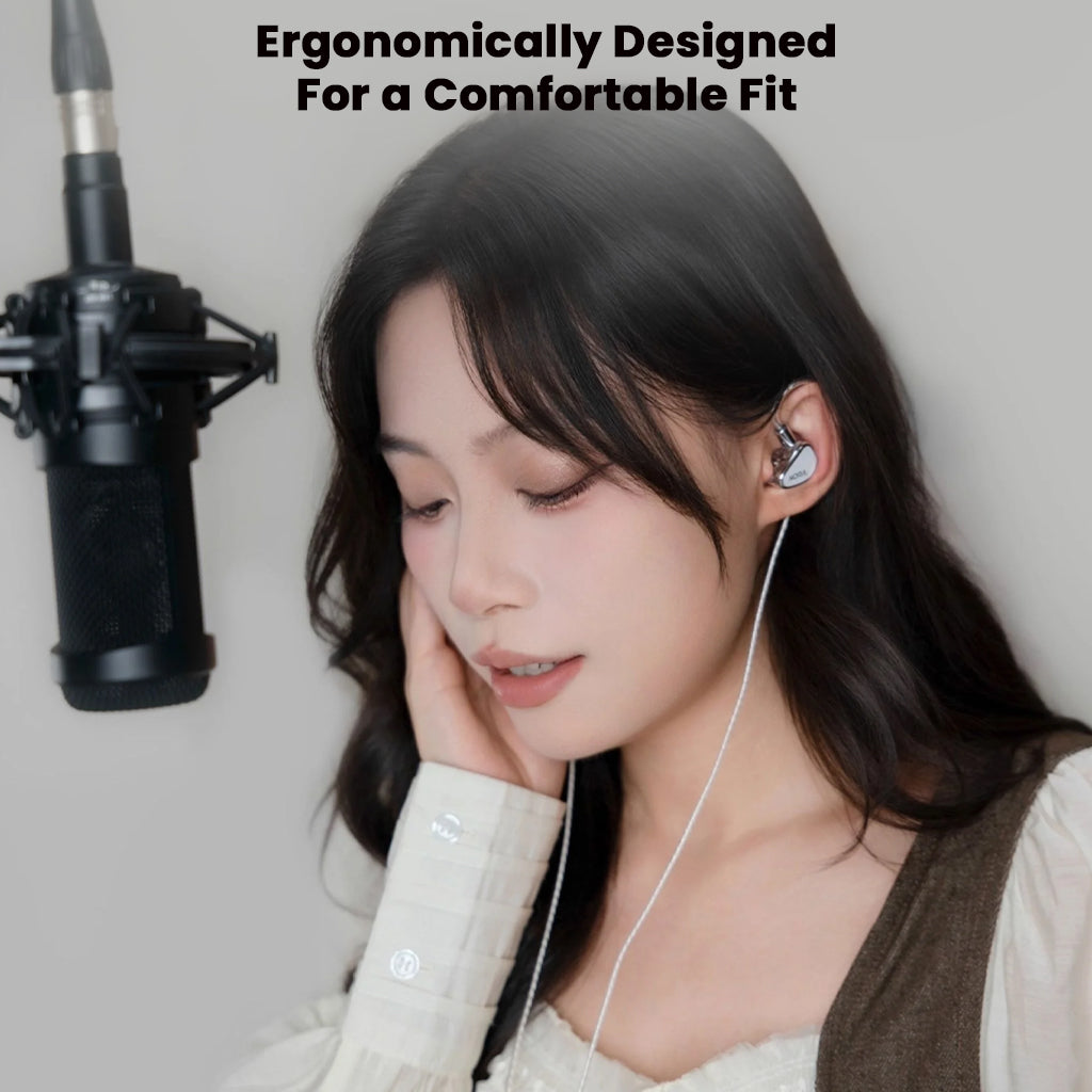 Woman wearing TANCHJIM NORA In ear Monitor, demonstrating ergonomic design and comfortable fit ideal for extended use and studio monitoring.