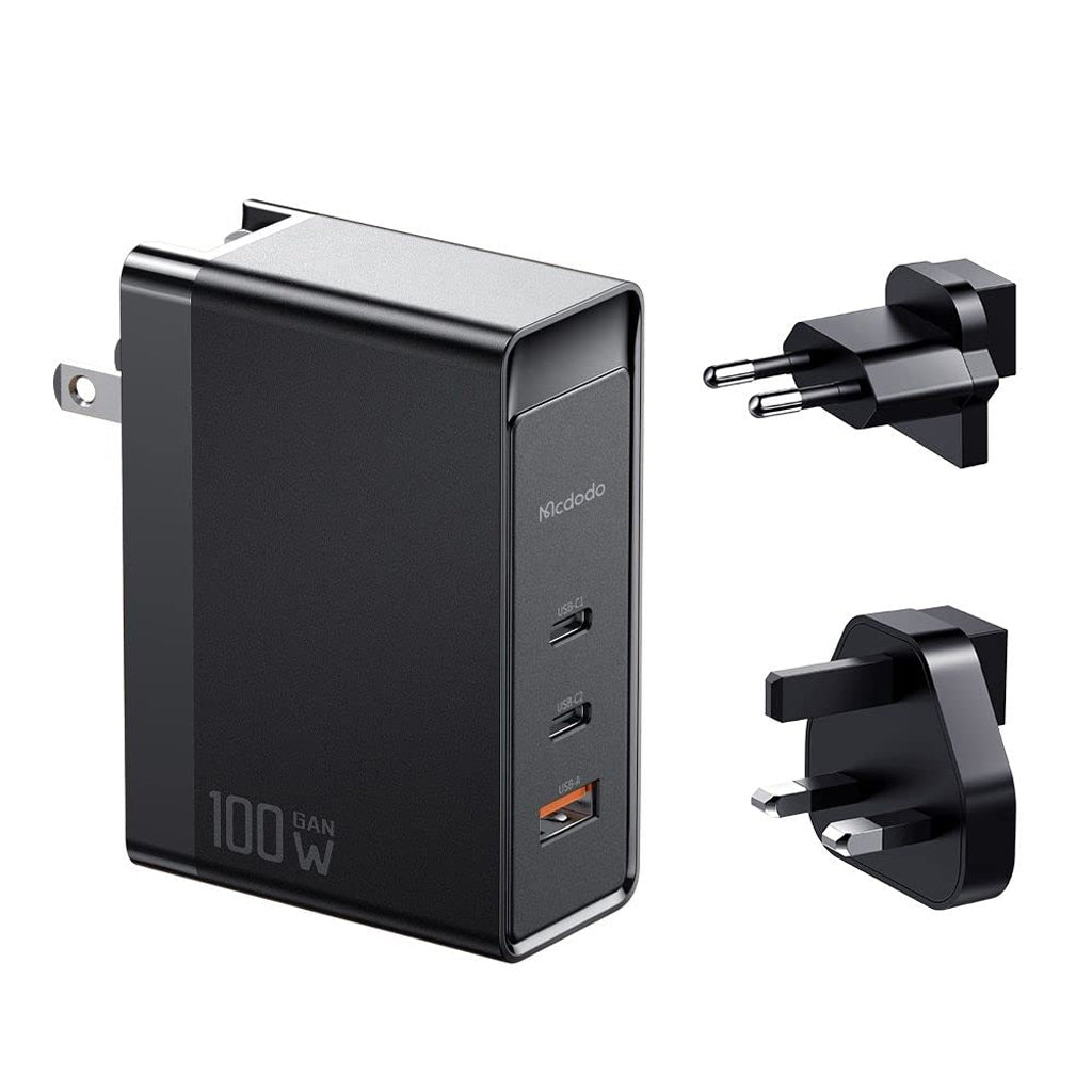 MCDODO 100W GaN charger with dual USB-C and USB-A ports, includes EU and UK plug adapters for universal compatibility.
