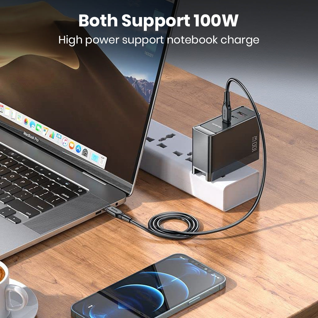 MCDODO 100W GaN charger powering a laptop via USB-C, ideal for high-power notebook charging with EU or UK plug support.