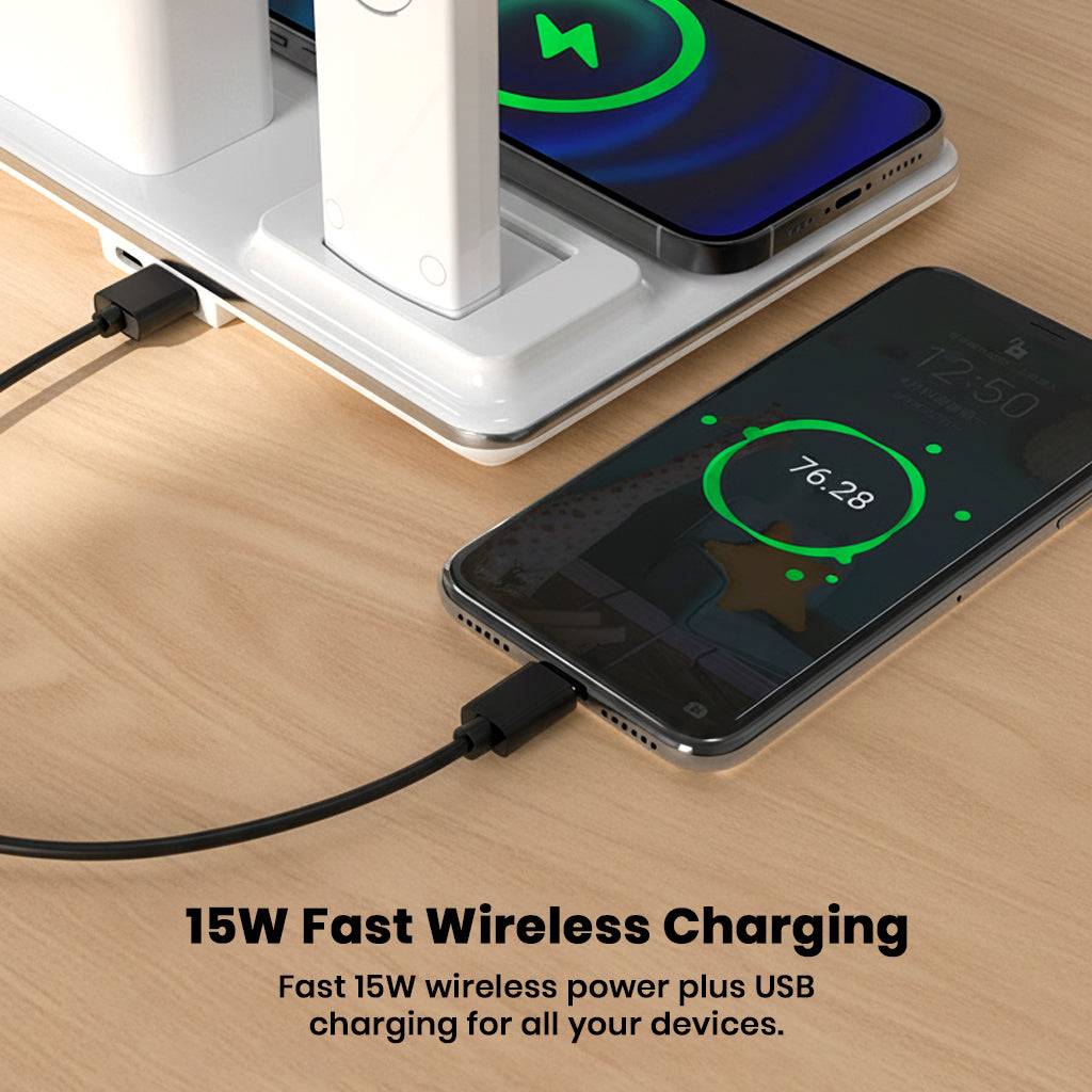 Close-up of TECPHILE Desk Lamp's 15W wireless charging pad and USB port charging a smartphone, ideal for multitasking workspaces.