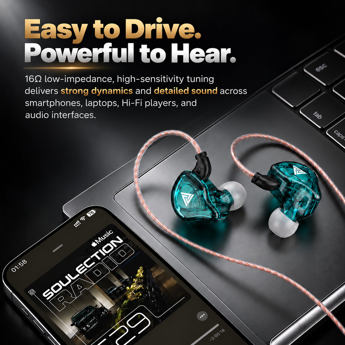 Black and teal transparent in-ear monitors with braided pink and white cables, placed on a laptop keyboard, showcasing high-fidelity audio design.