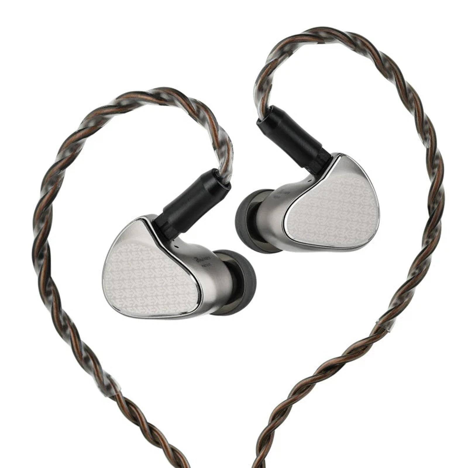 Close-up of silver and black in-ear monitors with twisted copper and silver braided cable, designed for high-fidelity audio