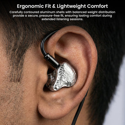 GENESIS G318 IEM worn in ear, showing ergonomic fit and lightweight comfort with secure over-ear cable placement for long listening sessions.