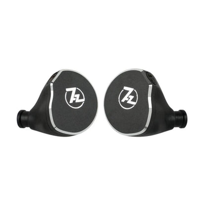 Close-up of 7HZ x Crinacle Diablo planar magnetic IEMs showcasing sleek black aluminum faceplates with 7HZ logo.