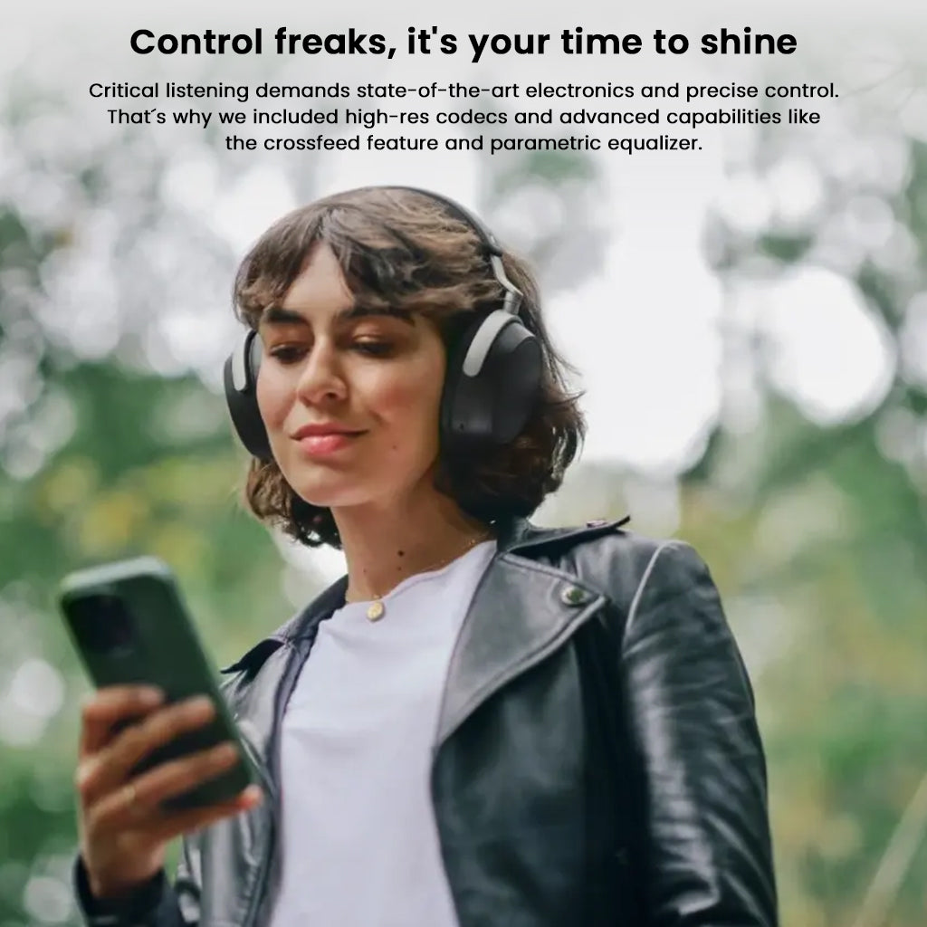 User controlling playback on phone while wearing Sennheiser HDB 630 headphones, emphasizing advanced audio features.