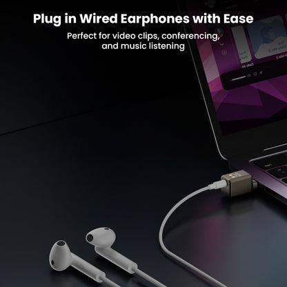 AUDIOCULAR- A19X adapter plugged into iPad with wired earphones, perfect for conferencing, video playback, and music.