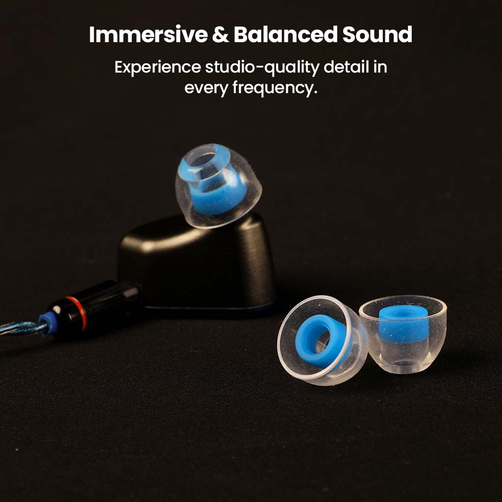 AUDIOCULAR Atmos Silicone Eartips displayed with IEMs, promoting immersive and balanced sound across all frequencies.