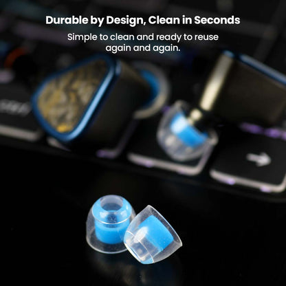 AUDIOCULAR Atmos Eartips on a keyboard, showcasing durable, easy-to-clean design for repeated use with in-ear monitors.