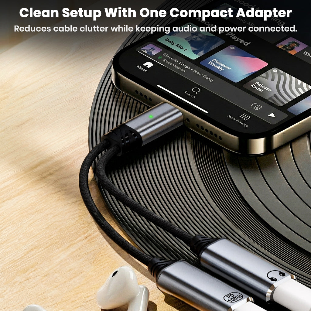 Audiocular D18 Adapter connected to a smartphone, offering a clean and compact setup that reduces cable clutter while maintaining audio and power.