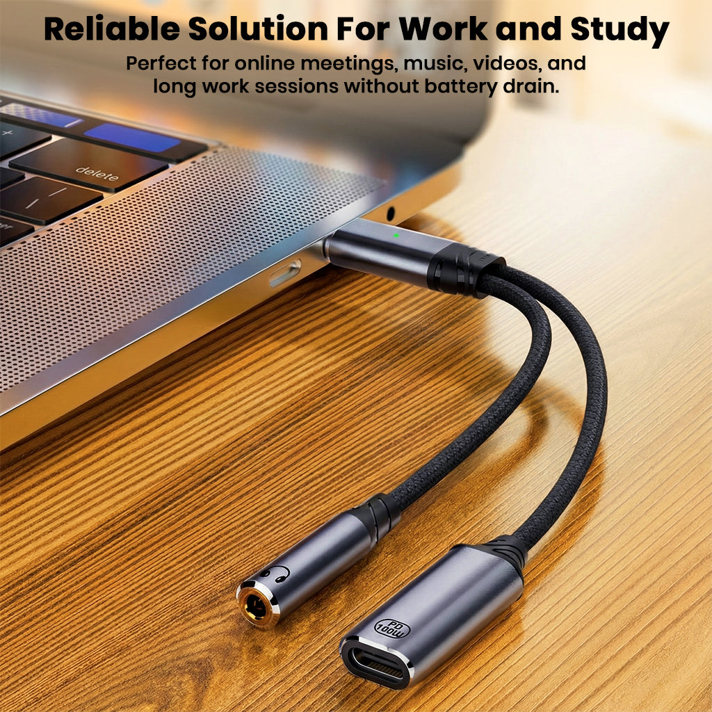 AUDIOCULAR D19 adapter connected to a laptop, enabling audio and charging for efficient work and study sessions.