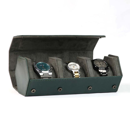 Green variant of AUDIOCULAR- RESO Watch Box with three watches displayed inside, offering stylish and protective storage for watch enthusiasts.