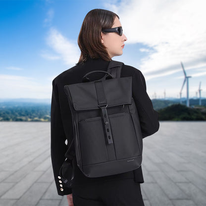 Model wearing BANGE 2888 Roll Top Laptop Backpack in black, showcasing its stylish and professional look for urban settings.