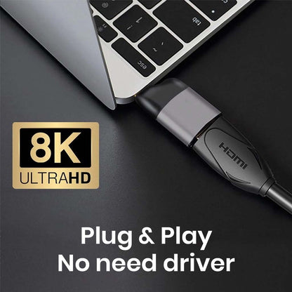 TECPHILE HDMI 2.1 to USB4 adapter plugged into laptop, supports 8K Ultra HD with plug-and-play functionality, no driver needed.