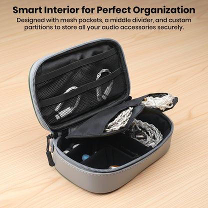 Interior view of AUDIOCULAR CRATE case showing mesh pockets, Velcro dividers, and organized storage for earphones and cables.