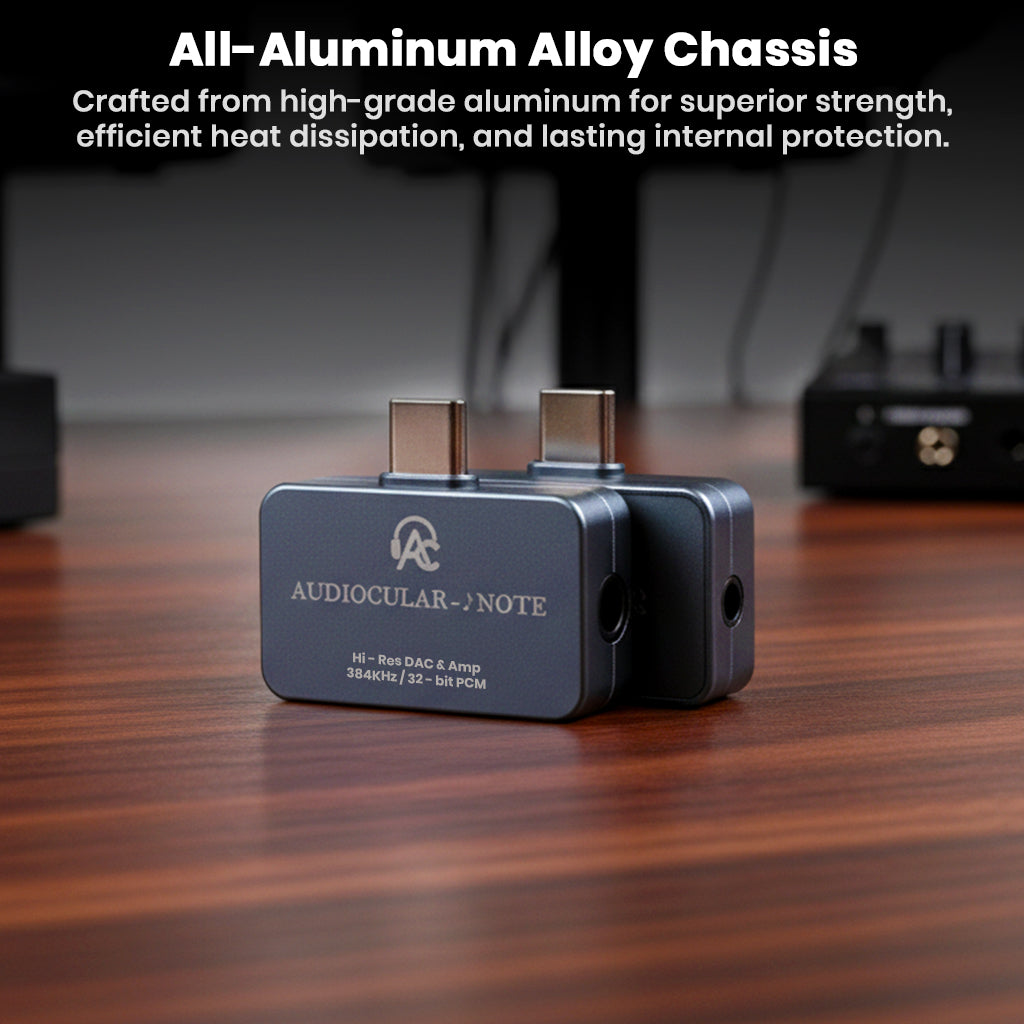 AUDIOCULAR - NOTE Hi-Res Portable DAC & Amp with all-aluminum alloy chassis for durability, heat dissipation, and internal protection on a wooden desk.