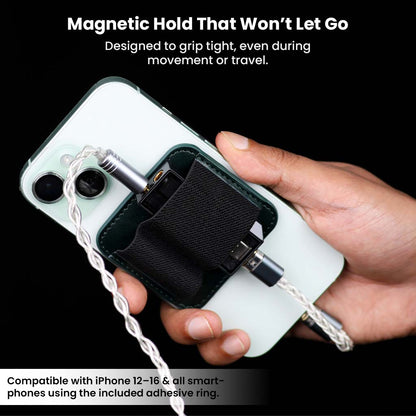AUDIOCULAR Magnetic DAC Holder attached to iPhone, showcasing strong magnetic grip and compatibility with USB DACs during movement.
