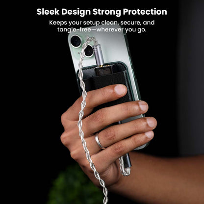 AUDIOCULAR Magnetic Dongle Holster in use, providing secure and tangle-free DAC setup with sleek design and strong grip on phone.