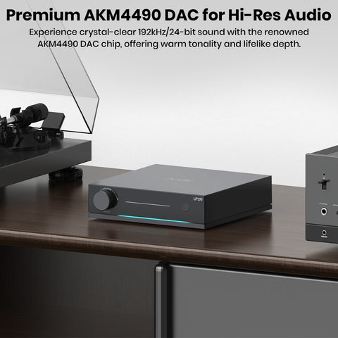 Arylic LP20 featuring AKM4490 DAC chip for 192kHz/24-bit hi-res audio, shown in a modern audio setup with turntable and amplifier.
