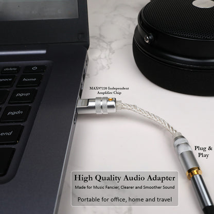 AUDIOCULAR DAC Dongle connected to laptop, featuring MAX97220 amplifier for smooth, clear sound in home or office use.