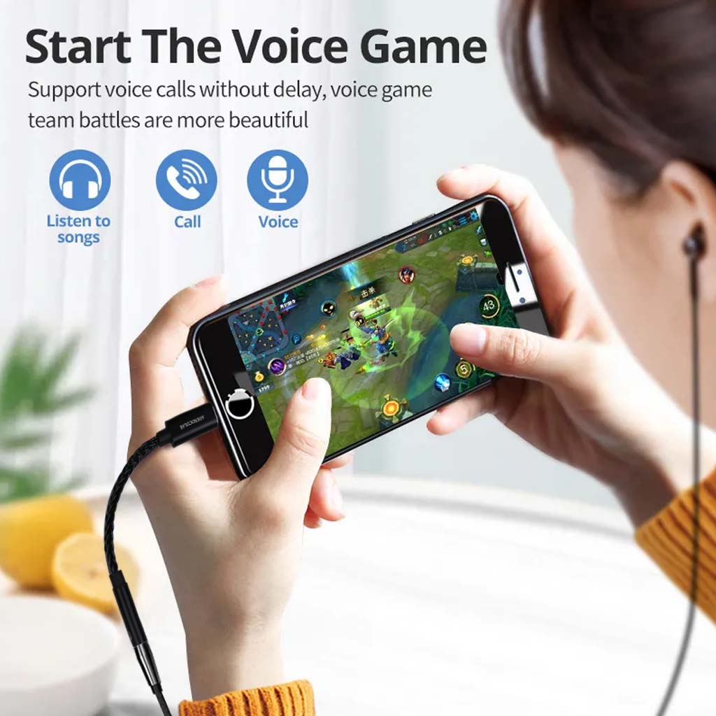 User playing mobile game with AUDIOCULAR D10 DAC Dongle, supporting voice calls and music playback for immersive gaming audio.