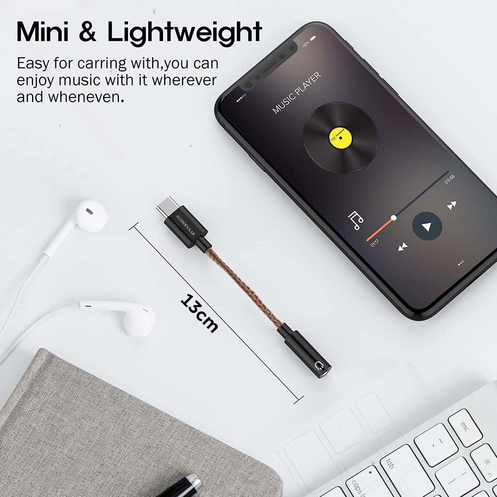 Compact 13cm AUDIOCULAR DAC Dongle with USB-C to 3.5mm connection, ideal for portable music listening on the go.