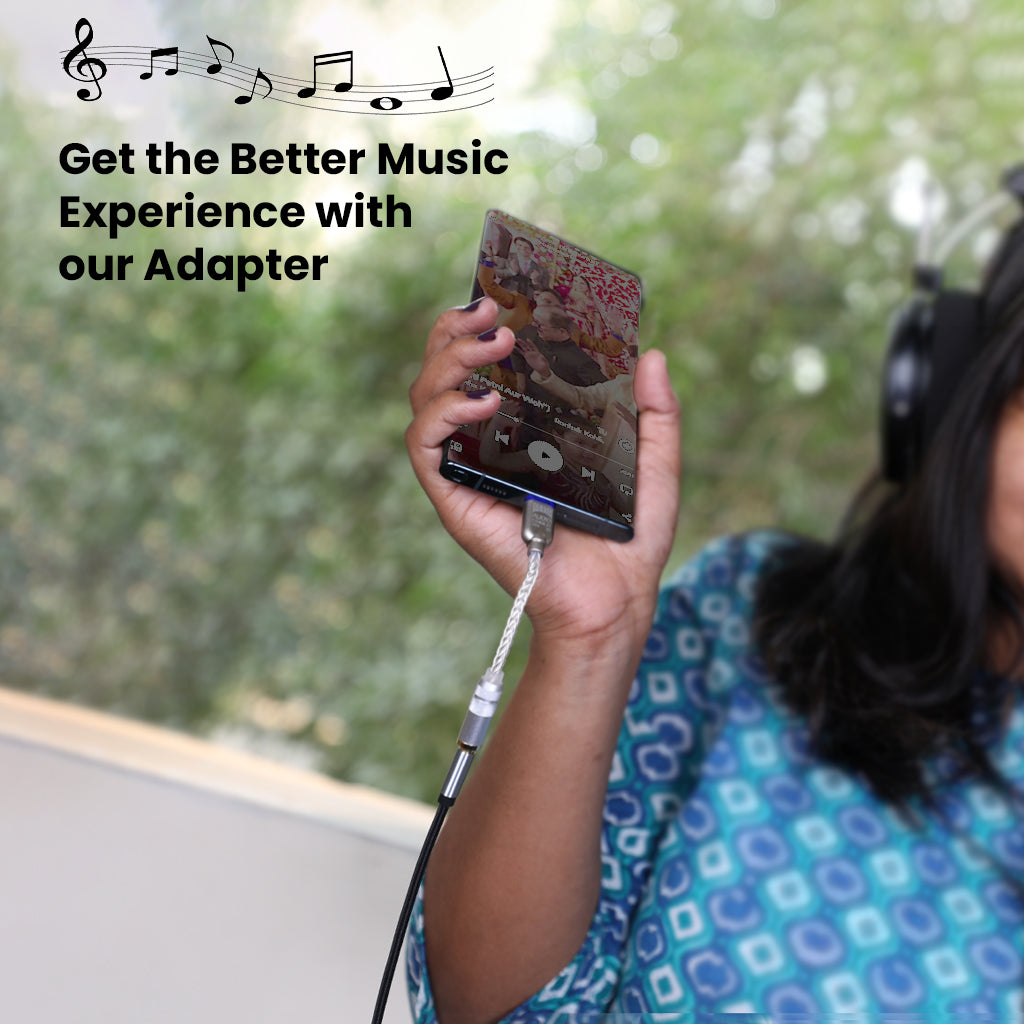 User enjoying music on phone using AUDIOCULAR D10 Type C to 3.5mm DAC Dongle for enhanced audio experience with headphones.