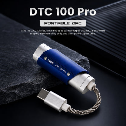 DUNU DTC 100 Pro portable DAC & amp connected to a laptop, showcasing its compact size, blue aluminum body, and twisted cable