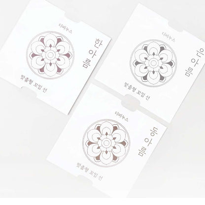 DIVINUS ARUM OCC Cable packaging inserts featuring traditional Korean floral designs, emphasizing cultural inspiration and product authenticity.