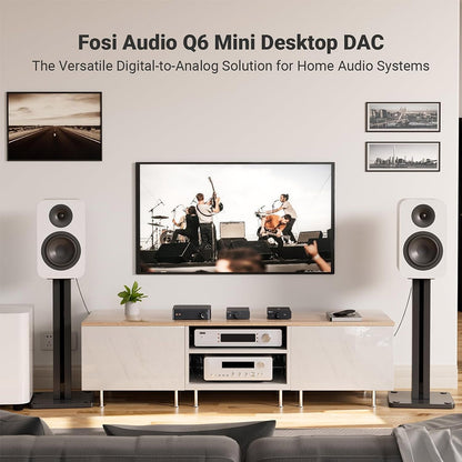 Fosi Audio Q6 DAC in a home audio setup with powered speakers, emphasizing its role as a compact digital-to-analog converter solution.