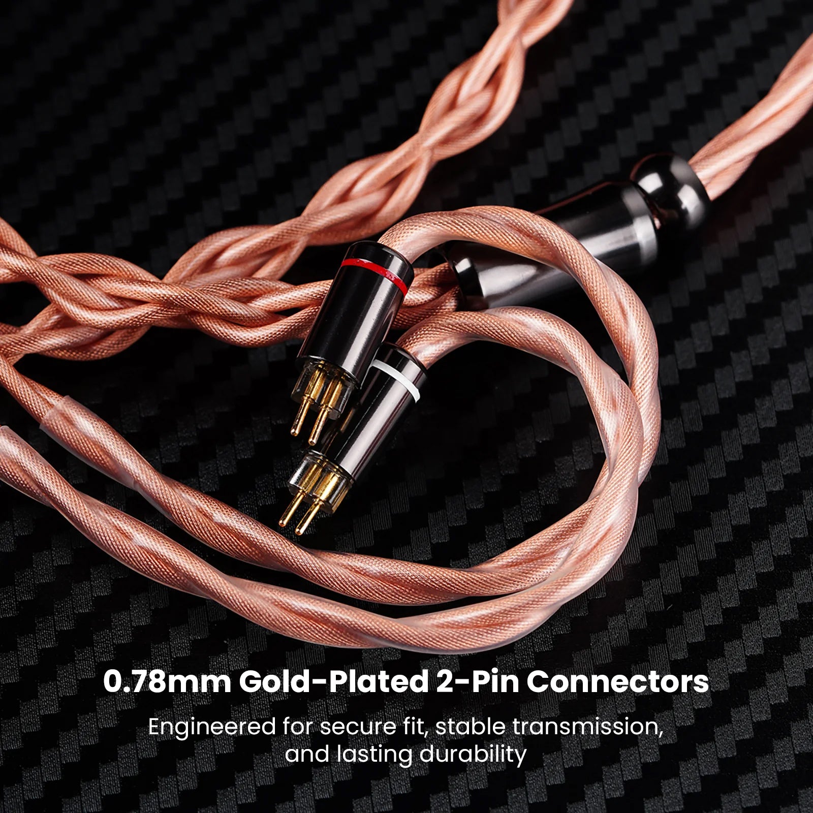 Black background with copper braided audio cable and connectors