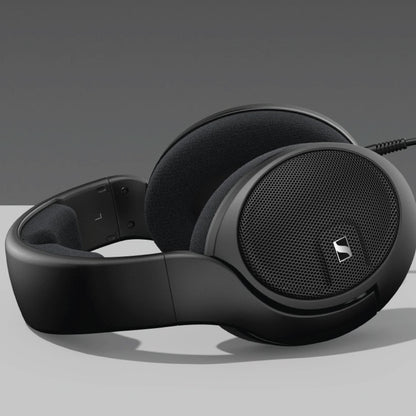 Side view of Sennheiser HD 560S open-back headphones with ergonomic design and breathable earcups for natural sound wave expansion.