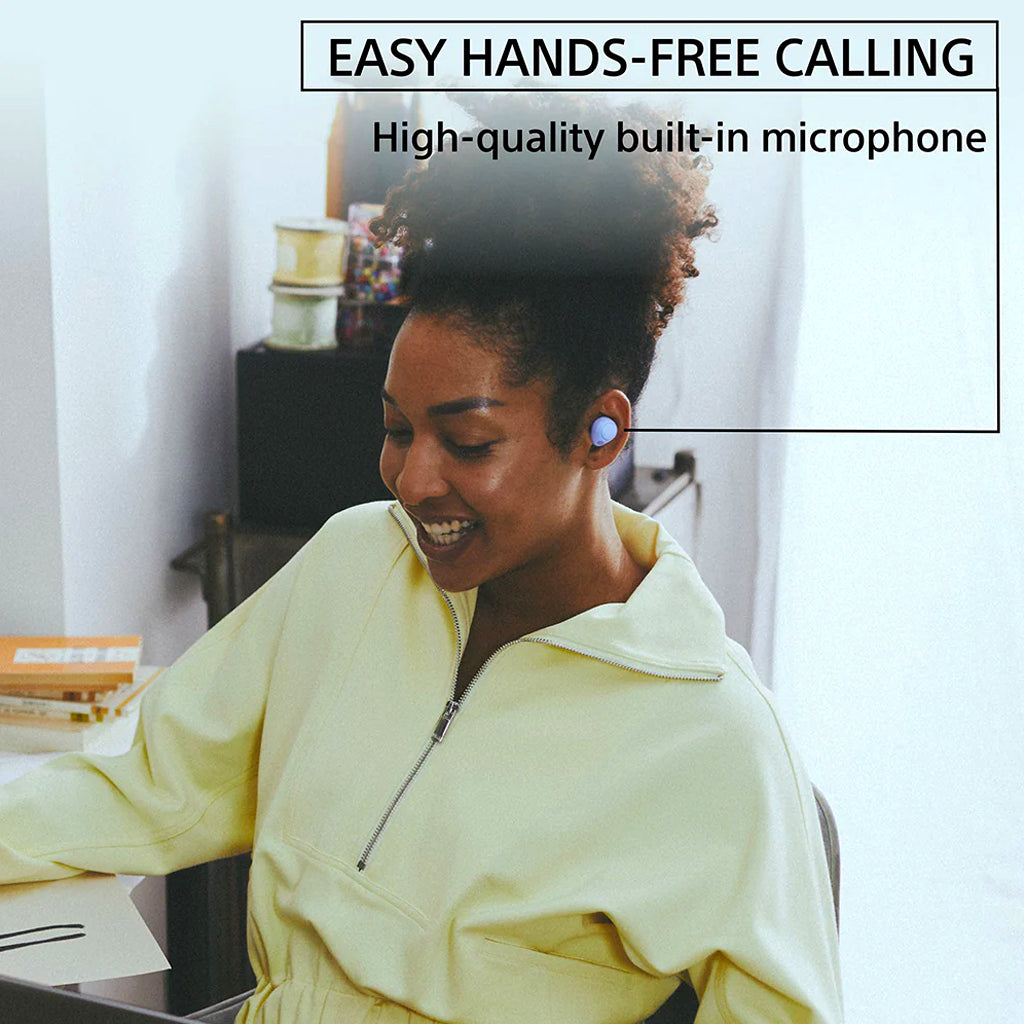 User enjoying hands-free calling with Sony WFC700N earbuds, featuring built-in microphone for clear voice communication.