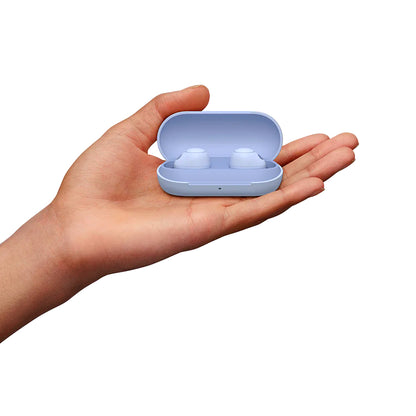 Sony WFC700N earbuds in lavender case held in hand, showcasing compact size and travel-friendly design for everyday use.