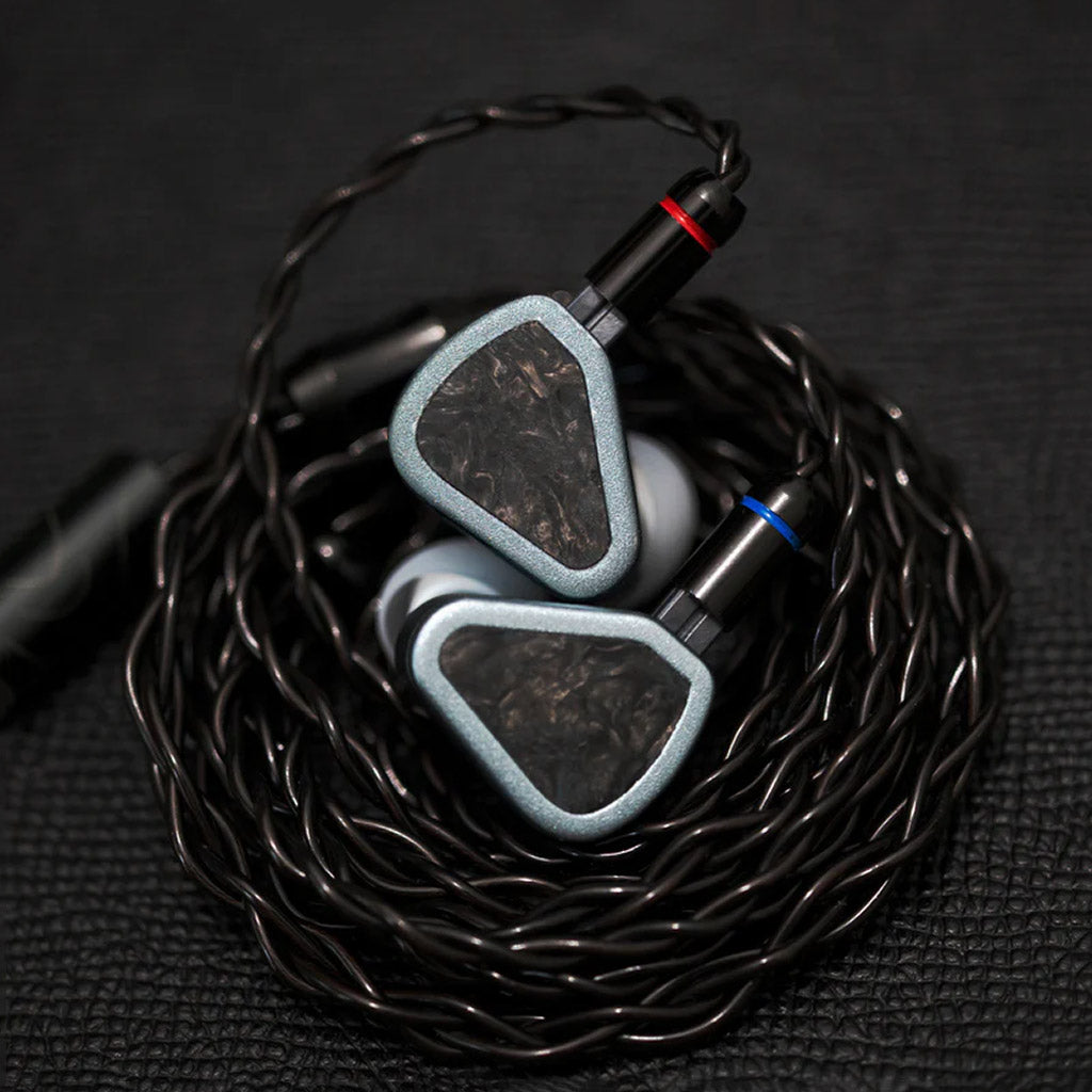 Coiled SYMPHONIUM Audio- Giant IEM (Launch Edition) with color-coded connectors for left and right channels, enhancing usability and clarity.