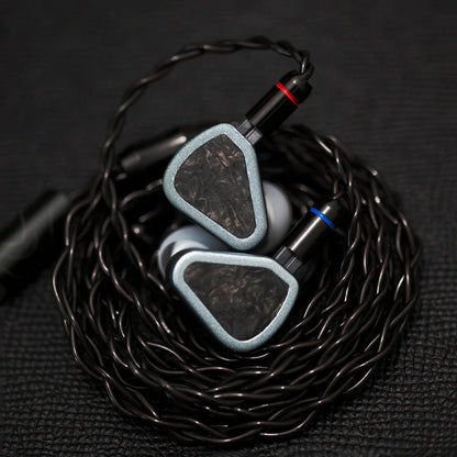 Coiled SYMPHONIUM Audio- Giant IEM (Launch Edition) with color-coded connectors for left and right channels, enhancing usability and clarity.