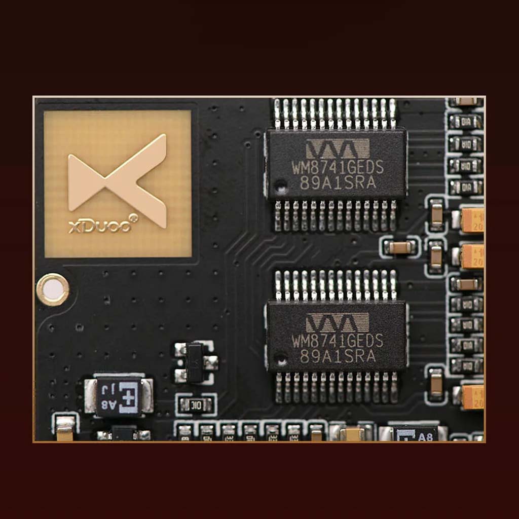 Close-up of xDuoo XD05 Pro DAC Card circuit board featuring dual Wolfson WM8741 chips for premium audio signal processing.